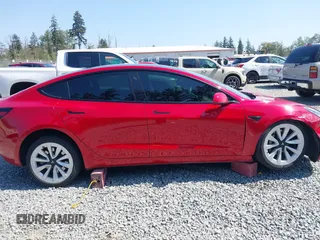 2021 Tesla Model 3 Long Range with VIN 5YJ3E1EB6MF054361, listed as a IAAI auction lot 42105247 with 58,986 mi miles and . Bid and sale history available at carsss.com. Image 13.
