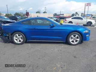 2018 Ford Mustang EcoBoost z VIN 1FA6P8TH0J5172447, wystawiony jako IAAI lot #41657679 z przebiegiem 21 422 mil mil oraz . Historia ofert i sprzedaży dostępna na DreamBid. Obrazek 13.