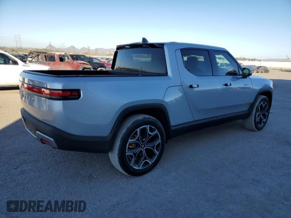 2023 Rivian R1T Adventure with VIN 7FCTGAAA7PN017844, listed as a Copart auction lot 44261105 with 4,590 mi miles and Clean Title. Bid and sale history available at carsss.com. Image 3.