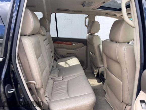2005 Lexus GX 470 with VIN JTJBT20X050079831, listed as a Copart auction lot 56405105 with 390,415 mi miles and Clean Title. Bid and sale history available at DreamBid. Image 6.