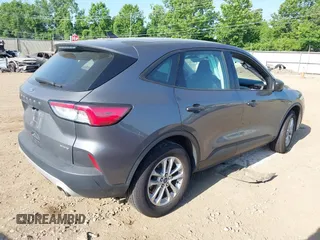 2021 Ford Escape S with VIN 1FMCU9F66MUA22600, listed as a IAAI auction lot 42579860 with 74,376 mi miles and . Bid and sale history available at DreamBid. Image 4.