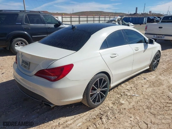 2014 Mercedes-Benz CLA-Class CLA 250 with VIN WDDSJ4GB1EN128221, listed as a IAAI auction lot 41338233 with 119,624 mi miles. Bid and sale history available at carsss.com. Image 4.