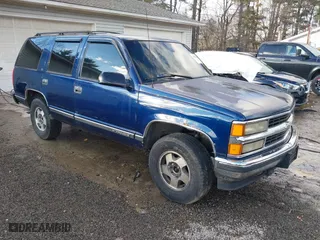 1998 Chevrolet Tahoe with VIN 1GNEK13RXWJ372276, listed as a IAAI auction lot 41458359 with 229,582 mi miles. Bid and sale history available at carsss.com. Image 1.