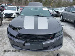 2020 Dodge Charger SXT with VIN 2C3CDXBG2LH213220, listed as a IAAI auction lot 41646409 with 92,616 mi miles and . Bid and sale history available at DreamBid. Image 12.