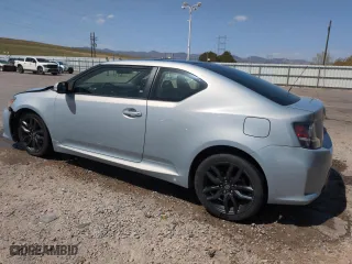 2014 Scion tC with VIN JTKJF5C78E3066805, listed as a Copart auction lot 52470145 with 82,111 mi miles and Salvage Title. Bid and sale history available at carsss.com. Image 2.