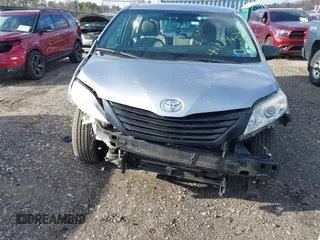 2015 Toyota Sienna L with VIN 5TDZK3DCXFS596277, listed as a IAAI auction lot 41229427 with 108,900 mi miles and . Bid and sale history available at DreamBid. Image 12.