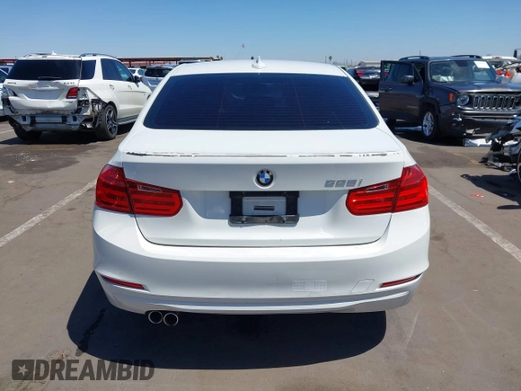 2015 BMW 3 Series 328i with VIN WBA3C1C52FK117753, listed as a IAAI auction lot 42270013 with 147,386 mi miles and . Bid and sale history available at DreamBid. Image 16.