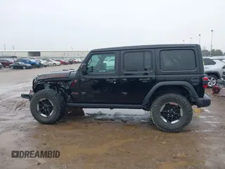 2019 Jeep Wrangler Unlimited Rubicon z VIN 1C4HJXFNXKW511193, wystawiony jako IAAI lot #41452579 z przebiegiem 91 857 mil mil oraz . Historia ofert i sprzedaży dostępna na DreamBid. Obrazek 15.