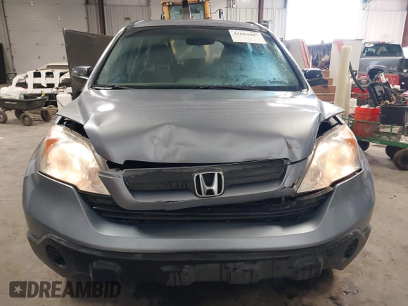 2009 Honda CR-V LX with VIN JHLRE48359C018488, listed as a IAAI auction lot 41824887 with 203,235 mi miles. Bid and sale history available at carsss.com. Image 12.