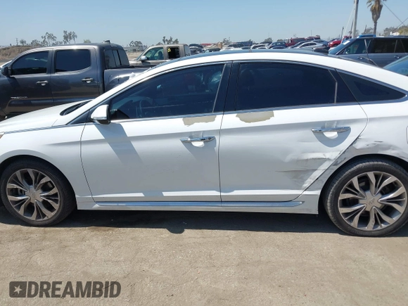 2015 Hyundai Sonata Sport with VIN 5NPE34ABXFH195251, listed as a IAAI auction lot 42002496 with 142,381 mi miles and . Bid and sale history available at carsss.com. Image 14.