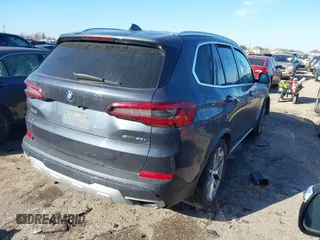 2020 BMW X5 sDrive40i with VIN 5UXCR4C05L9C54889, listed as a IAAI auction lot 41671983 with Not Provided miles and . Bid and sale history available at DreamBid. Image 4.