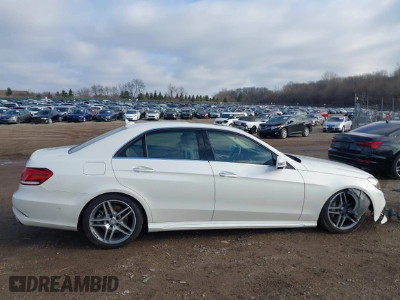2014 Mercedes-Benz E 550 Sport with VIN WDDHF9BB5EA949457, listed as a IAAI auction lot 41128583 with 99,248 mi miles and . Bid and sale history available at DreamBid. Image 13.
