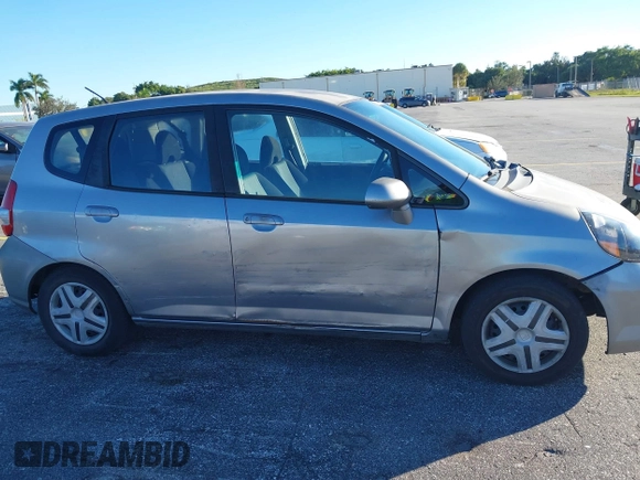 2007 Honda Fit with VIN JHMGD38447S039540, listed as a IAAI auction lot 40985790 with 227,295 mi miles. Bid and sale history available at carsss.com. Image 6.