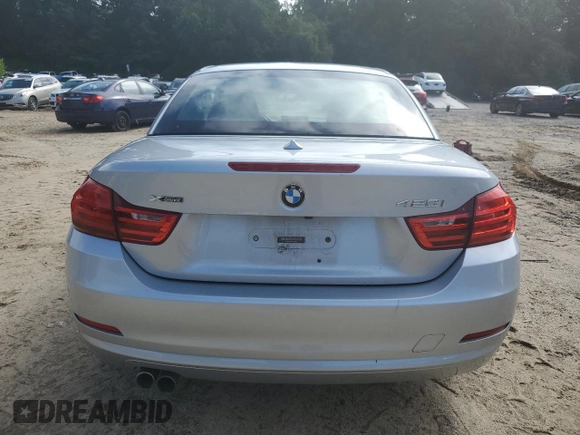2015 BMW 4 Series 428i xDrive with VIN WBA3T1C50FP820674, listed as a Copart auction lot 65258363 with 93,950 mi miles and . Bid and sale history available at carsss.com. Image 6.