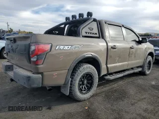 2024 Nissan Titan Pro-4X with VIN 1N6AA1ED3RN103011, listed as a Copart auction lot 87050954 with 8,829 mi miles and Salvage title. Bid and sale history available at DreamBid. Image 3.