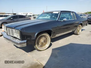 1979 Oldsmobile 88 z VIN 3N37R9X135017, wystawiony jako Copart lot #75752324 z przebiegiem 10 954 mil mil oraz Tytuł czysty. Historia ofert i sprzedaży dostępna na DreamBid. Obrazek 1.