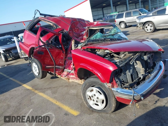 2000 Chevrolet Blazer LS z VIN 1GNDT13W6YK162818, wystawiony jako IAAI lot #42161533 z przebiegiem Nie podano mil oraz . Historia ofert i sprzedaży dostępna na DreamBid. Obrazek 1.