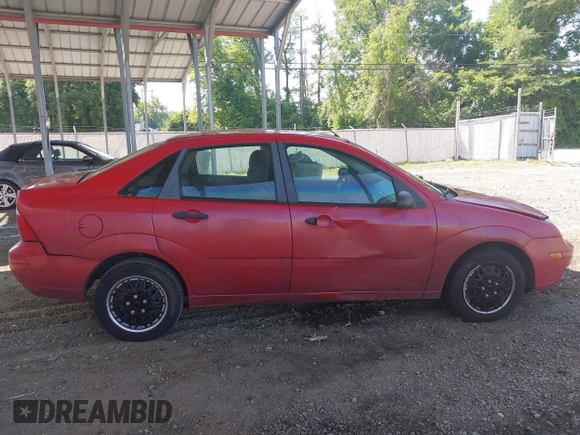 2007 Ford Focus S z VIN 1FAFP34N07W363568, wystawiony jako IAAI lot #42557496 z przebiegiem 120 123 mil mil oraz . Historia ofert i sprzedaży dostępna na DreamBid. Obrazek 13.