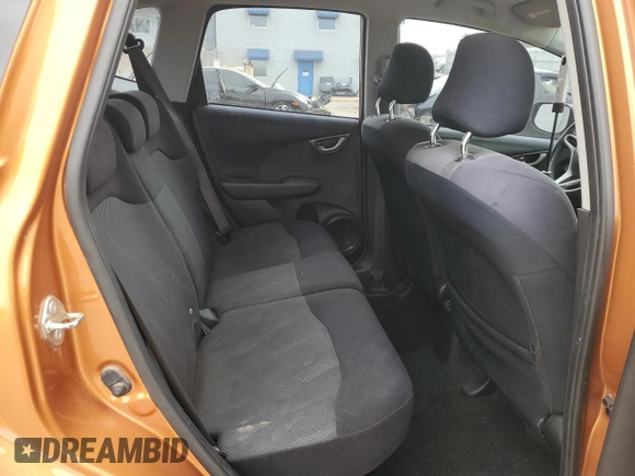 2009 Honda Fit Sport z VIN JHMGE88429S025410, wystawiony jako Copart lot #84963934 z przebiegiem 122 807 mil mil oraz Szkoda całkowita • Salvage title. Historia ofert i sprzedaży dostępna na DreamBid. Obrazek 10.