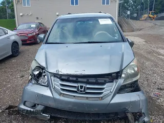 2010 Honda Odyssey EX with VIN 5FNRL3H4XAB015955, listed as a IAAI auction lot 42590535 with Not provided miles and . Bid and sale history available at DreamBid. Image 11.
