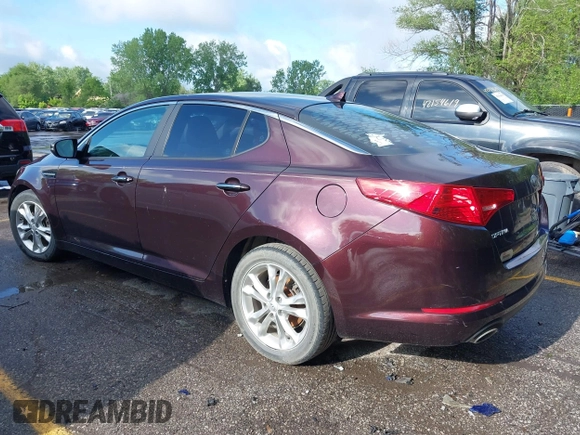 2013 Kia Optima EX with VIN 5XXGN4A71DG178586, listed as a IAAI auction lot 42171185 with 148,391 mi miles. Bid and sale history available at carsss.com. Image 3.