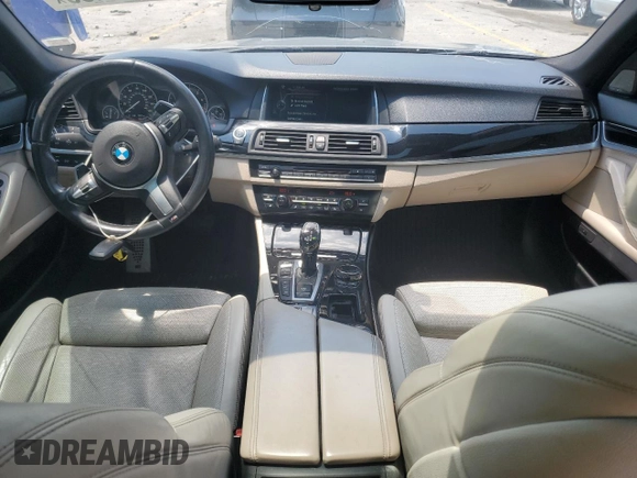 2014 BMW 5 Series 550i xDrive with VIN WBAKP9C51EDZ34830, listed as a Copart auction lot 59906435 with 123,709 mi miles and Salvage title. Bid and sale history available at DreamBid. Image 8.