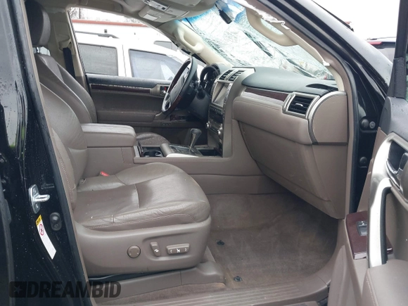 2014 Lexus GX 460 with VIN JTJBM7FX6E5073973, listed as a IAAI auction lot 41610332 with 128,870 mi miles. Bid and sale history available at carsss.com. Image 5.