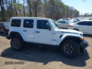 2023 Jeep Wrangler Rubicon with VIN 1C4JJXR68PW584303, listed as a IAAI auction lot 42049098 with 29,565 mi miles and . Bid and sale history available at DreamBid. Image 13.