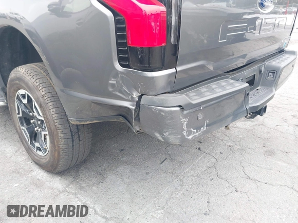 2023 Ford F-150 Lightning Pro with VIN 1FTVW1EL8PWG48559, listed as a IAAI auction lot 42033123 with 8,845 mi miles and . Bid and sale history available at DreamBid. Image 19.