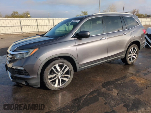 2017 Honda Pilot Touring with VIN 5FNYF6H95HB083610, listed as a Copart auction lot 50806045 with 200,897 mi miles and Salvage Title. Bid and sale history available at DreamBid. Image 1.