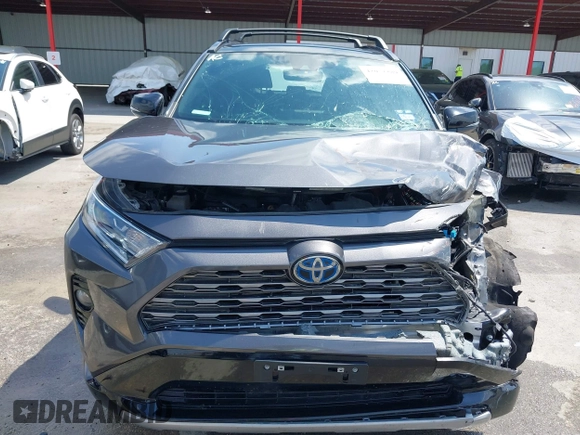 2021 Toyota RAV4 Hybrid XSE with VIN 2T3E6RFV8MW026973, listed as a IAAI auction lot 42052289 with 94,857 mi miles and . Bid and sale history available at DreamBid. Image 17.