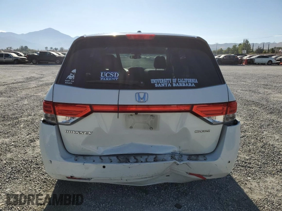 2016 Honda Odyssey Touring Elite with VIN 5FNRL5H9XGB006981, listed as a Copart auction lot 63970385 with 165,164 mi miles and Salvage title. Bid and sale history available at DreamBid. Image 6.