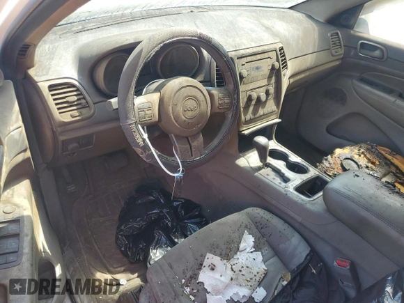 2011 Jeep Grand Cherokee Laredo with VIN 1J4RR4GG8BC572470, listed as a Copart auction lot 64953985 with 171,777 mi miles and Clean title. Bid and sale history available at DreamBid. Image 8.