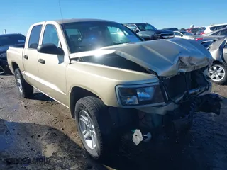 2011 Ram Dakota Bighorn/Lonestar with VIN 1D7RE3GKXBS506286, listed as a IAAI auction lot 41245124 with 156,867 mi miles. Bid and sale history available at carsss.com. Image 1.