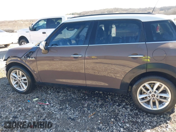 2014 MINI Countryman S with VIN WMWZC3C5XEWP52054, listed as a IAAI auction lot 41452354 with 104,873 mi miles and . Bid and sale history available at DreamBid. Image 15.