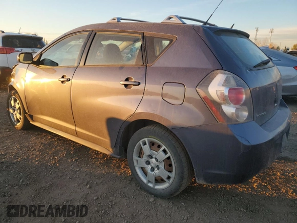 2009 Pontiac Vibe with VIN 5Y2SM67069Z446233, listed as a Copart auction lot 76932424 with 291,671 mi miles and Salvage Title. Bid and sale history available at carsss.com. Image 2.
