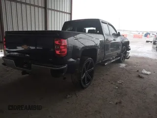 2015 Chevrolet Silverado 1500 LT with VIN 1GCRCREC5FZ402543, listed as a IAAI auction lot 41290500 with 136,079 mi miles. Bid and sale history available at carsss.com. Image 4.