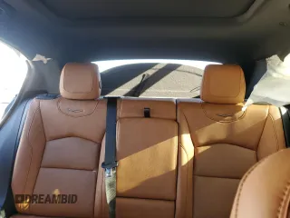 2024 Cadillac XT4 FWD Sport with VIN 1GYFZER40RF249101, listed as a Copart auction lot 76312304 with 1,969 mi miles and Salvage title. Bid and sale history available at DreamBid. Image 10.