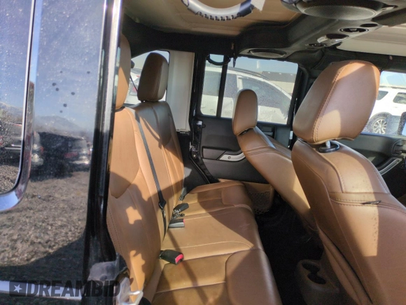 2013 Jeep Wrangler Unlimited Rubicon 10th Anniversary z VIN 1C4HJWFG6DL557085, wystawiony jako Copart lot #41693075 z przebiegiem 139 240 mil mil oraz Szkoda całkowita • Salvage title. Historia ofert i sprzedaży dostępna na DreamBid. Obrazek 10.