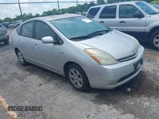 2007 Toyota Prius z VIN JTDKB20U277563022, wystawiony jako IAAI lot #42551498 z przebiegiem 228 017 mil mil oraz . Historia ofert i sprzedaży dostępna na DreamBid. Obrazek 1.