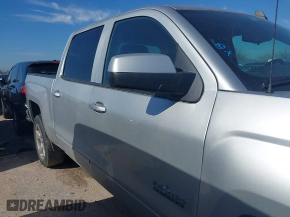 2015 Chevrolet Silverado 1500 LT with VIN 3GCPCREH0FG152809, listed as a IAAI auction lot 41573835 with 213,410 mi miles and . Bid and sale history available at DreamBid. Image 13.