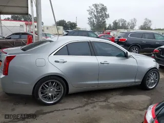 2013 Cadillac ATS Luxury with VIN 1G6AB5RX9D0156834, listed as a IAAI auction lot 41870392 with 60,952 mi miles. Bid and sale history available at carsss.com. Image 14.