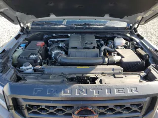2024 Nissan Frontier SL with VIN 1N6ED1EK9RN657838, listed as a Copart auction lot 42253895 with 10,012 mi miles and Salvage title. Bid and sale history available at DreamBid. Image 12.