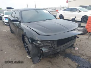 2018 Dodge Charger SXT Plus with VIN 2C3CDXHG3JH323343, listed as a IAAI auction lot 41948905 with 158,543 mi miles and . Bid and sale history available at carsss.com. Image 1.