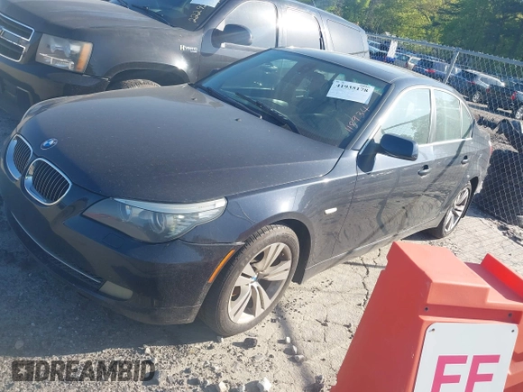 2009 BMW 5 Series 528i with VIN WBANU53569C118934, listed as a IAAI auction lot 41935178 with 208,848 mi miles and . Bid and sale history available at carsss.com. Image 2.