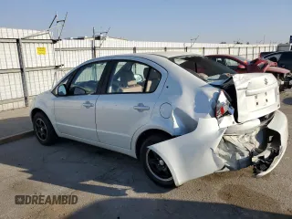 2009 Suzuki SX4 Man FWD with VIN JS2YC412796200908, listed as a Copart auction lot 73821924 with 125,721 mi miles and Salvage Title. Bid and sale history available at carsss.com. Image 2.