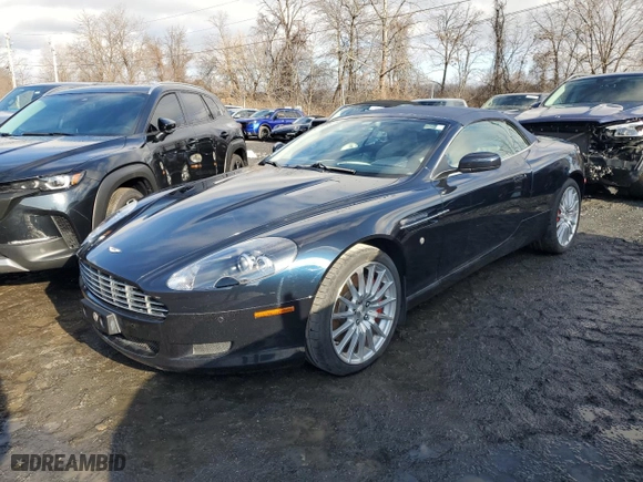2009 Aston Martin DB9 with VIN SCFAD02E79GB10991, listed as a Copart auction lot 85487894 with 0 mi miles and Salvage Title. Bid and sale history available at carsss.com. Image 1.