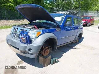 2007 Dodge Nitro SXT z VIN 1D8GU28K07W565166, wystawiony jako IAAI lot #42343272 z przebiegiem 152 813 mil mil oraz . Historia ofert i sprzedaży dostępna na DreamBid. Obrazek 2.