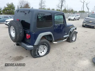 2006 Jeep Wrangler Sport with VIN 1J4FA49S16P737060, listed as a IAAI auction lot 41784197 with 42,030 mi miles. Bid and sale history available at carsss.com. Image 4.