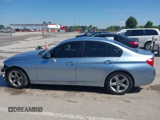 2014 BMW 3 Series 320i xDrive with VIN WBA3C3C59EF986353, listed as a IAAI auction lot 42383107 with 142,836 mi miles and . Bid and sale history available at DreamBid. Image 14.